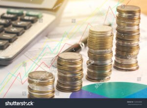 calcolatrice documenti fiscali e monete accatastate