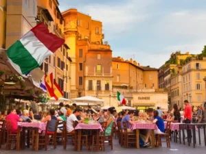 Come Si Dice "Good Afternoon" in Italiano 34 sole splendente su piazza italiana affollata